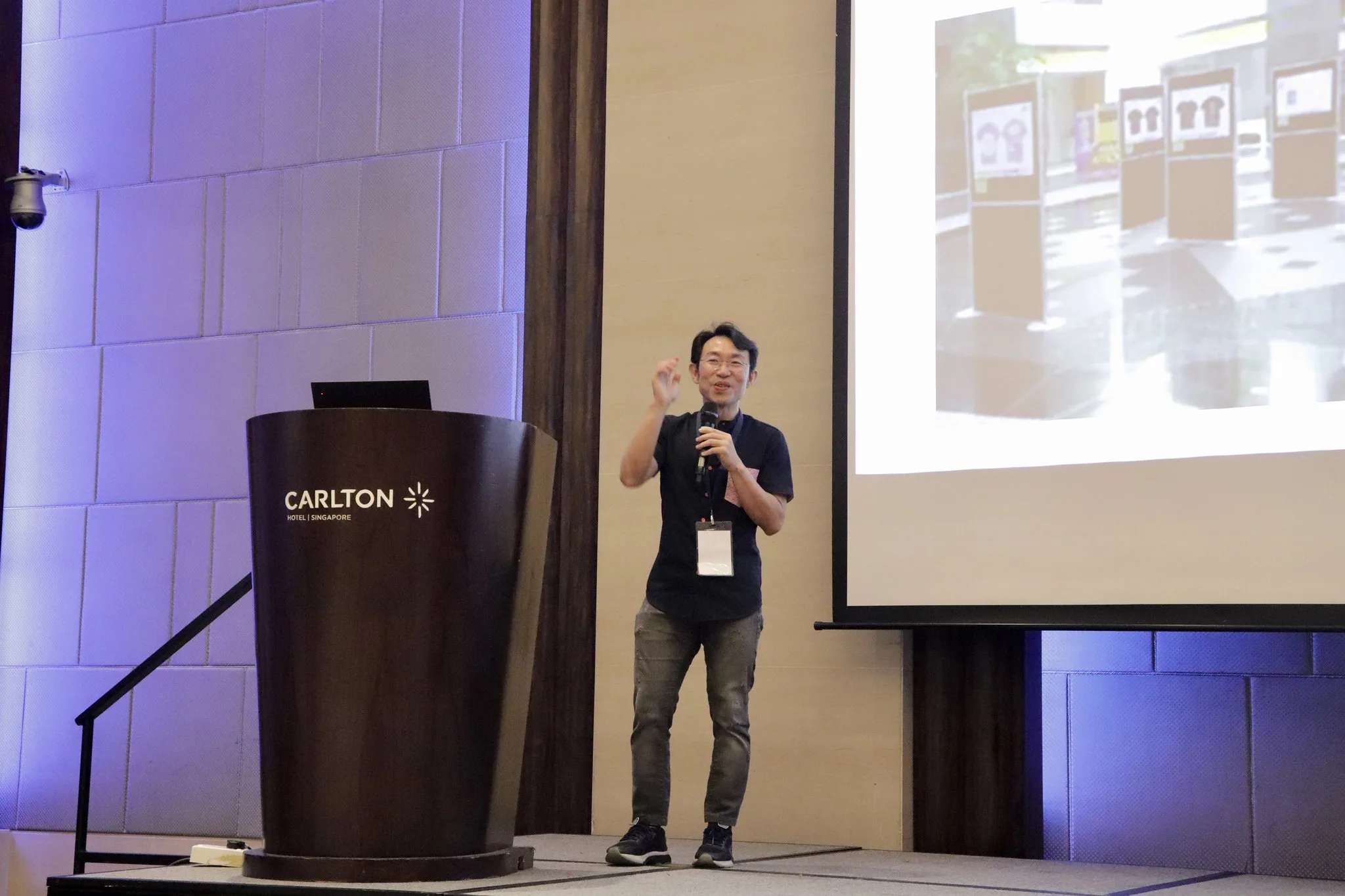 Hady making announcements during the conference